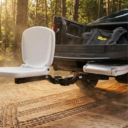 Tailbreaker seat attached to a truck bed with a forest background